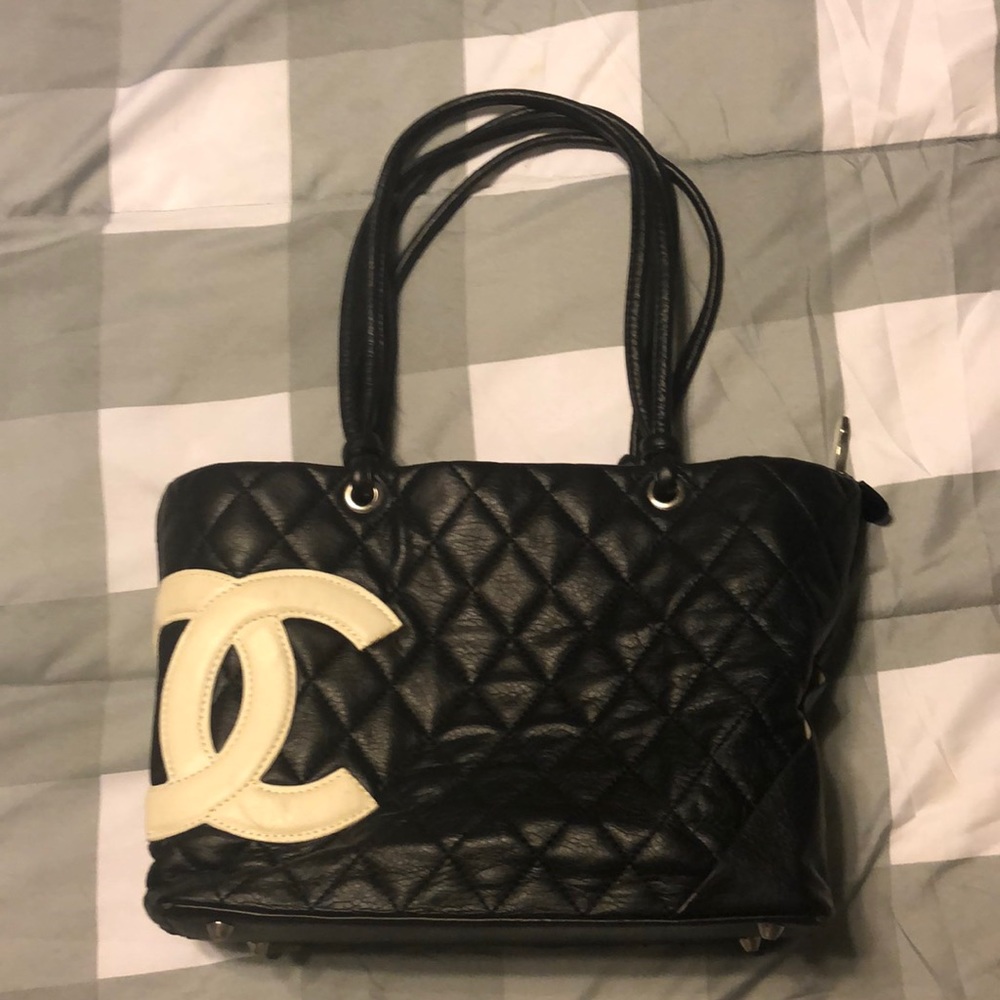 Black Chanel-like purse **not genuine**
